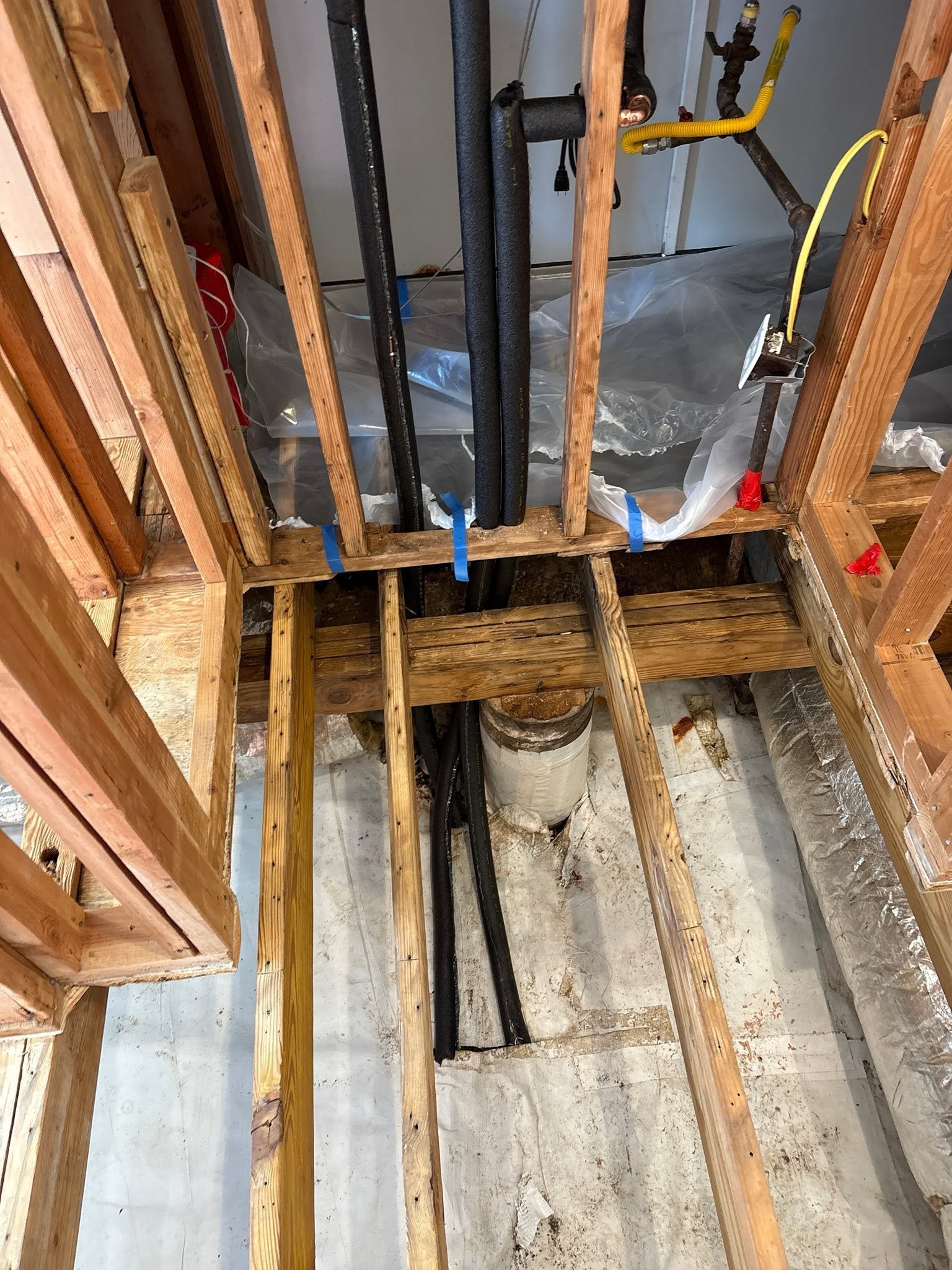 Underfloor pipe insulation by Cody Mundie
